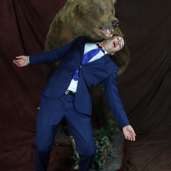 Aris Dreimanis and Bear having a friendly tumble.