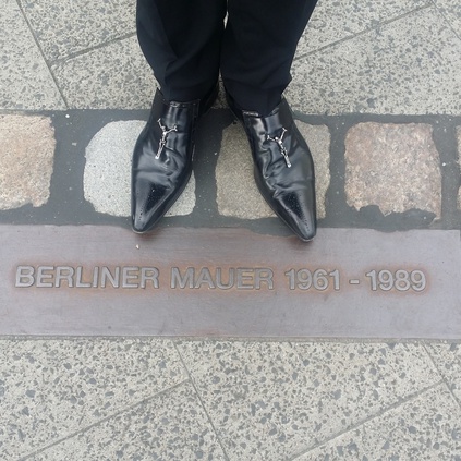 Rusty Egan at the Berlin Wall in his Ziggy Skull Horsleys!