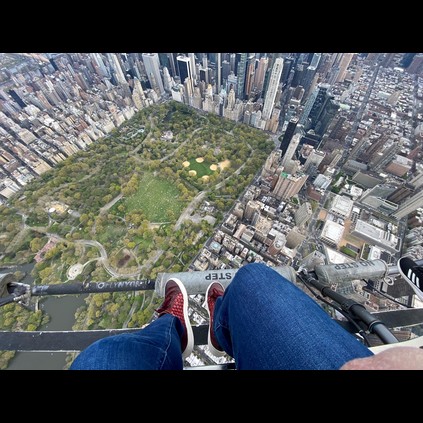 Mr Simon James flying high over Central Park New York